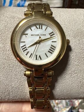 Michael Kors Gold Tone Round Roman Numeral Watch women’s